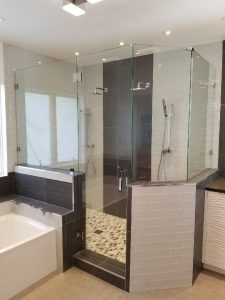 Custom corner shower installed in a Coconut Creek bathroom