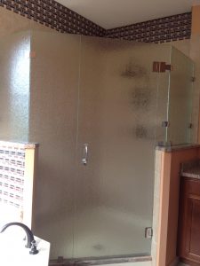 Custom shower door installed in a Lake Worth bathroom