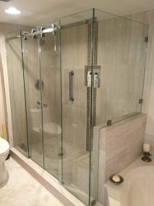 Custom shower doors installed in a Royal Palm Beach bathroom